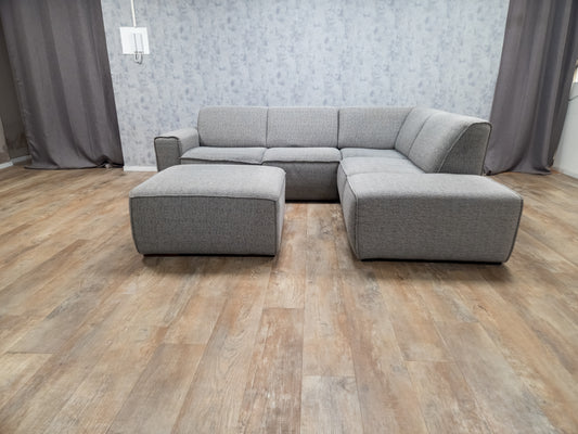 Mooi Grijs Hoekbank met Hocker