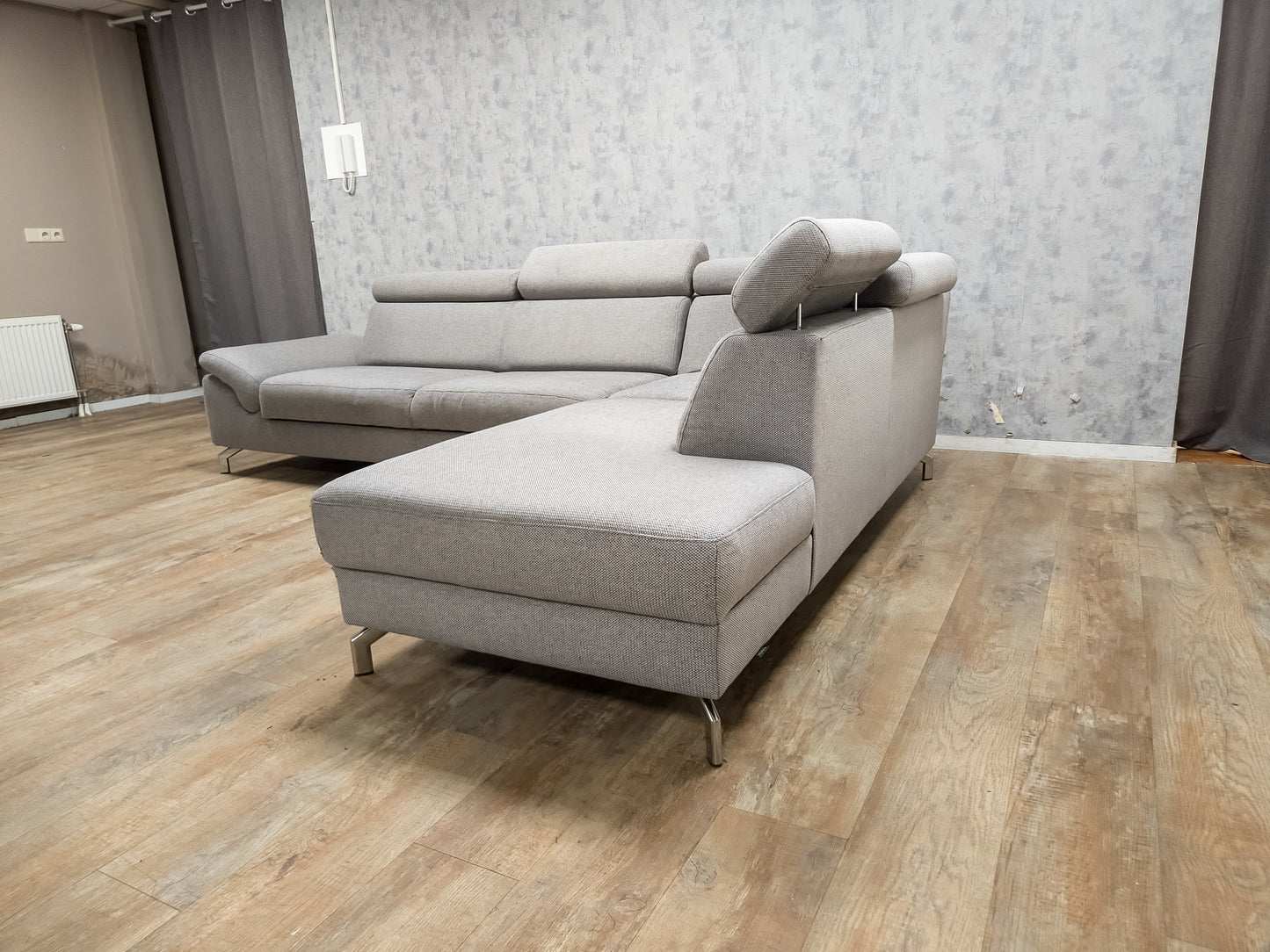 MONTEL Grijze Hoekbank met Verstelbare Hoofdsteunen